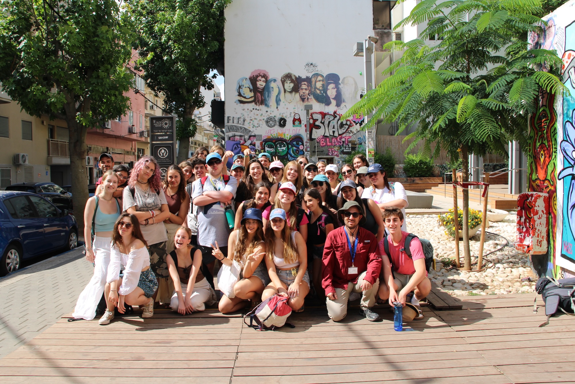 Group of people smiling outdoors