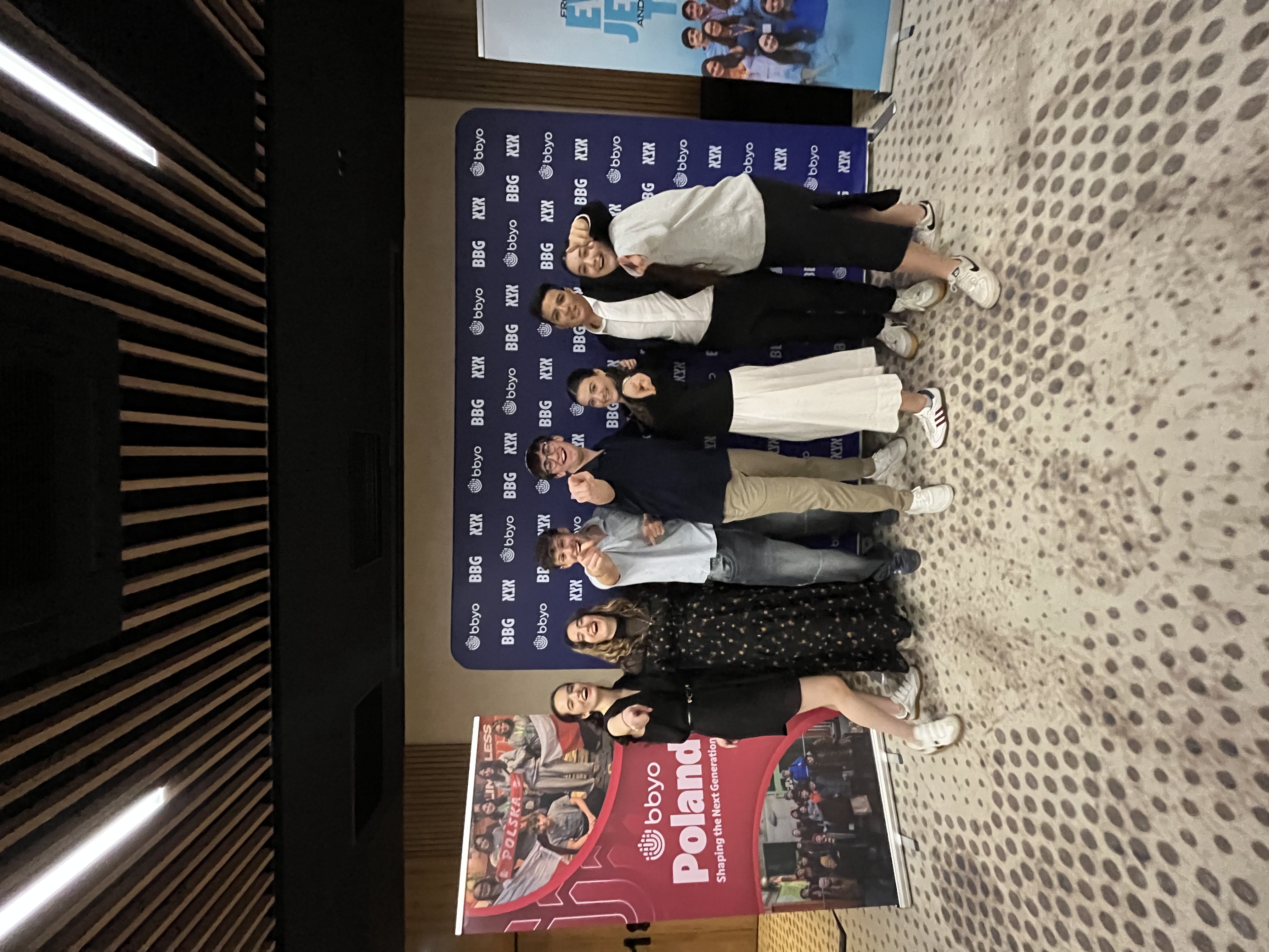 Group of people celebrating on stage