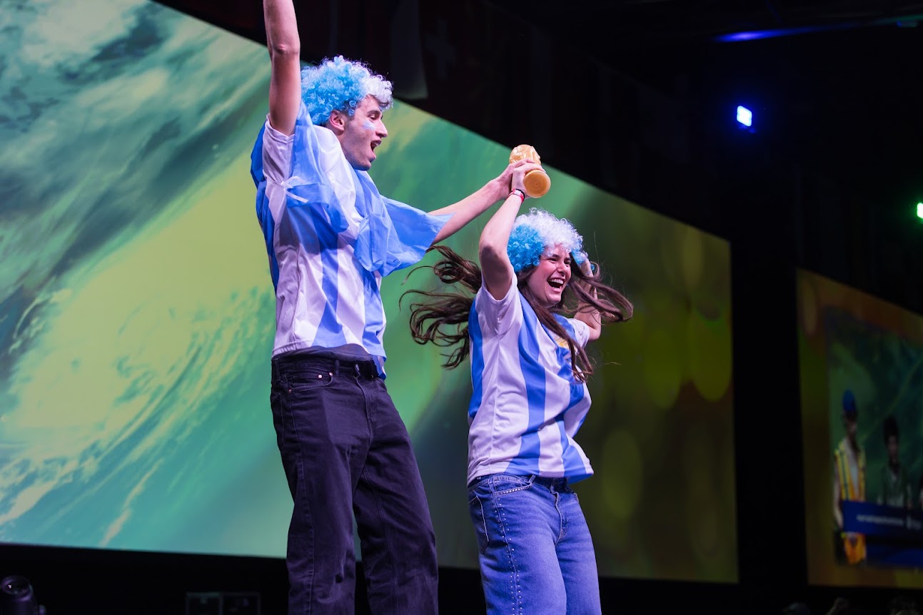 Group of people celebrating on stage