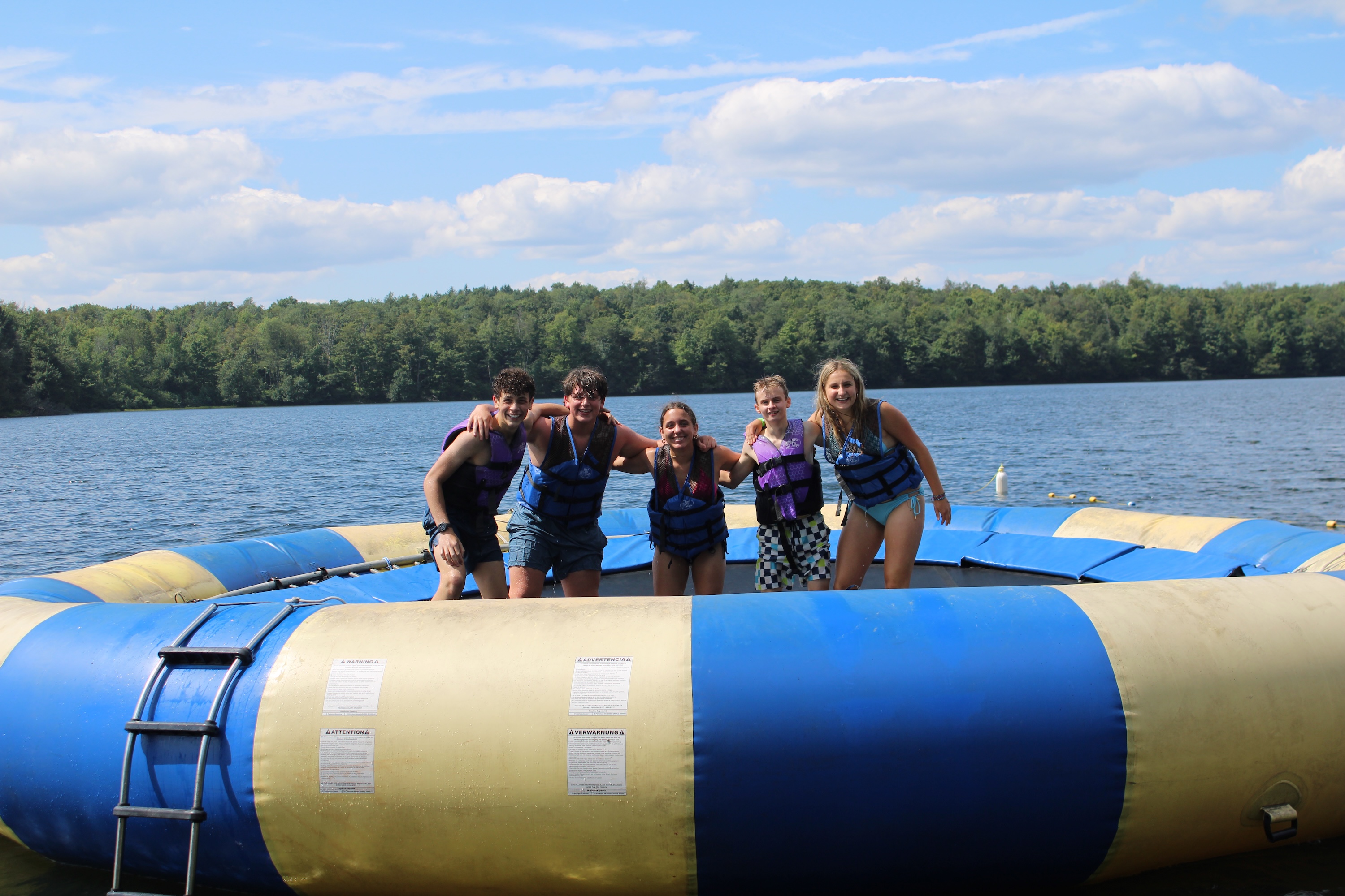 Group of people smiling outdoors