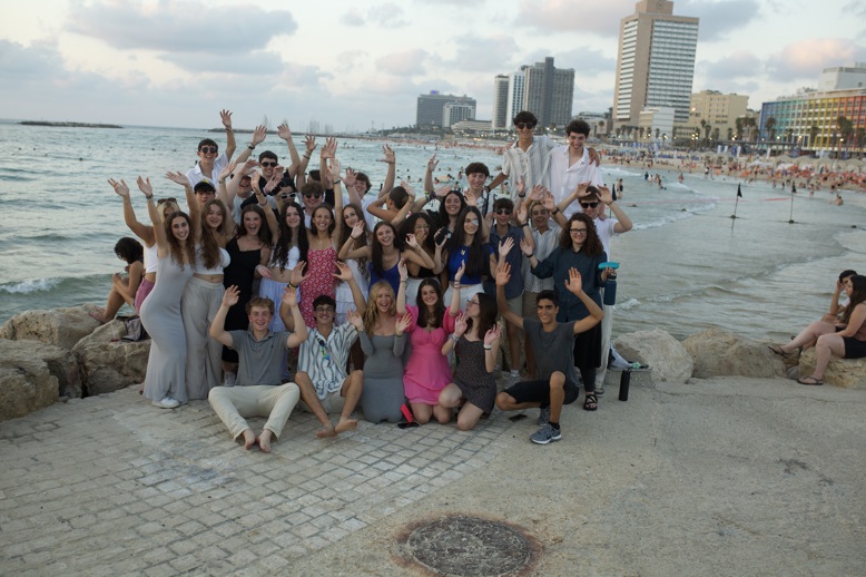 Group of people smiling outdoors
