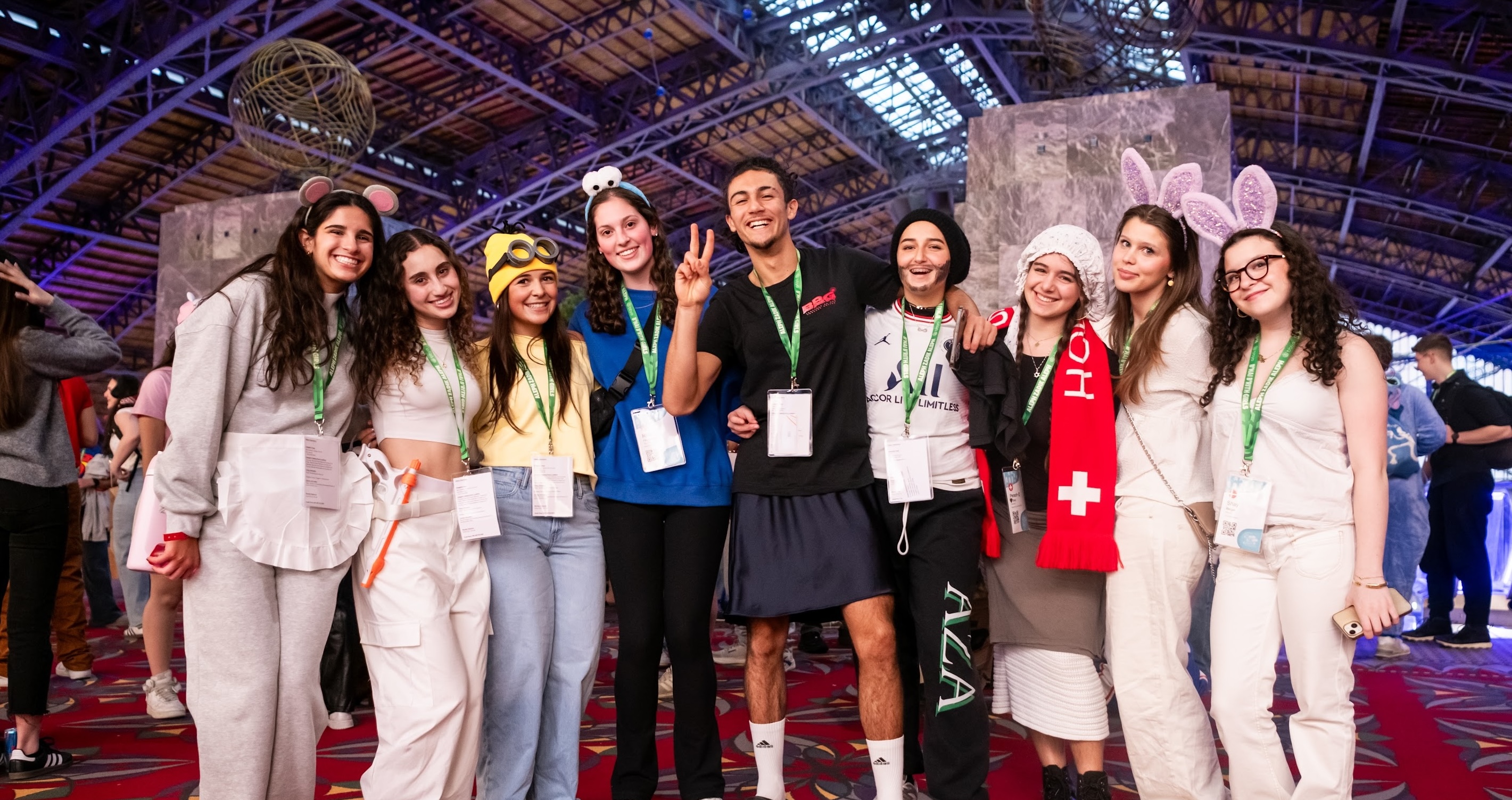 Group of diverse young people smiling at a community event