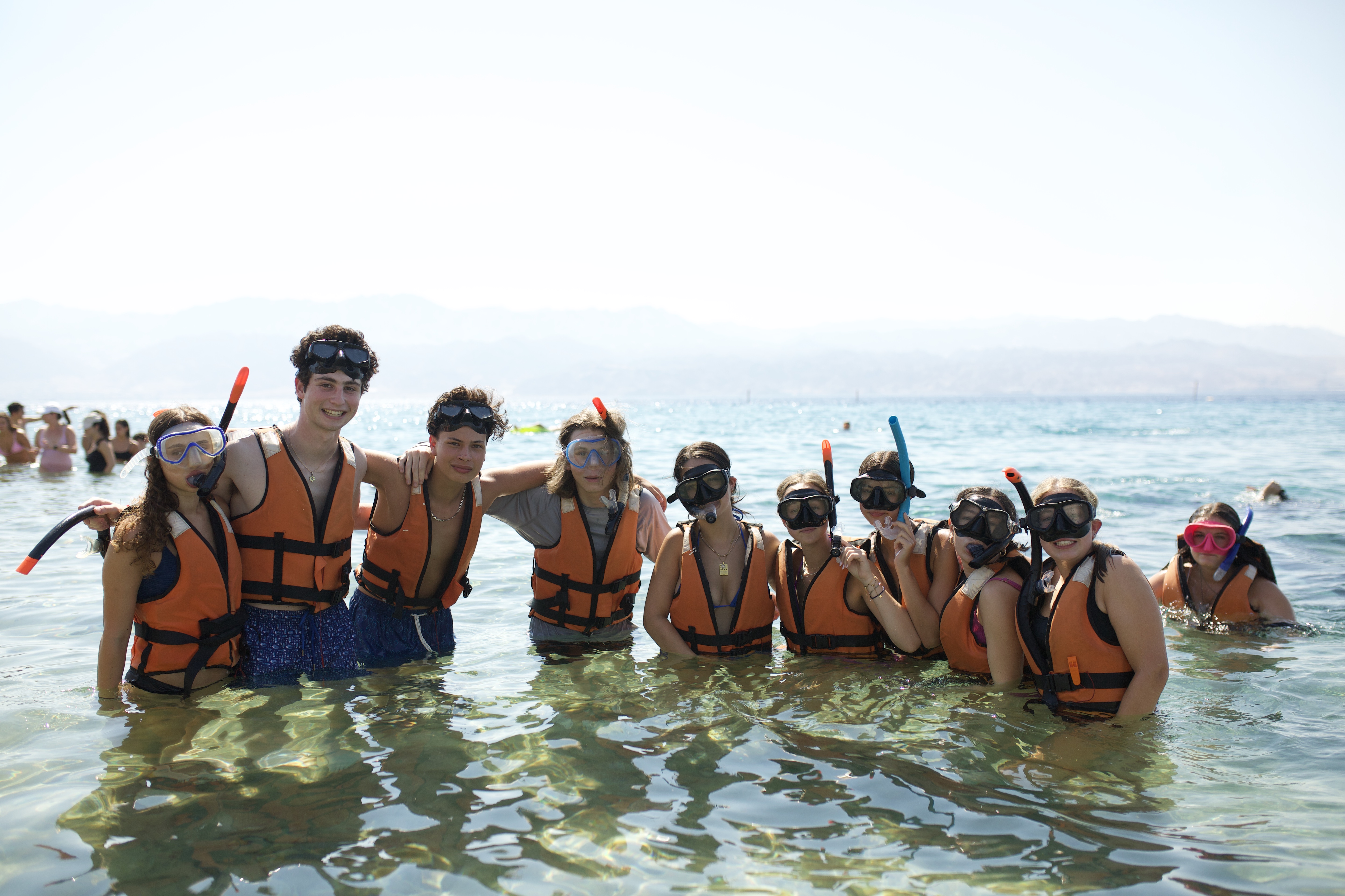 Group of people smiling outdoors
