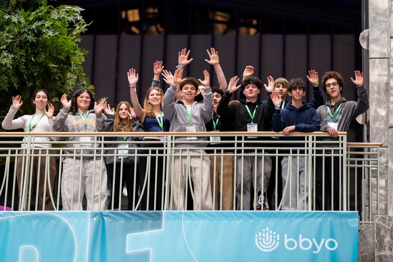 Group of diverse young people smiling at a community event