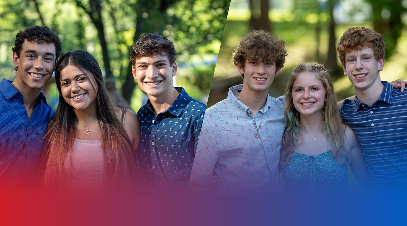 Group of diverse young people smiling at a community event
