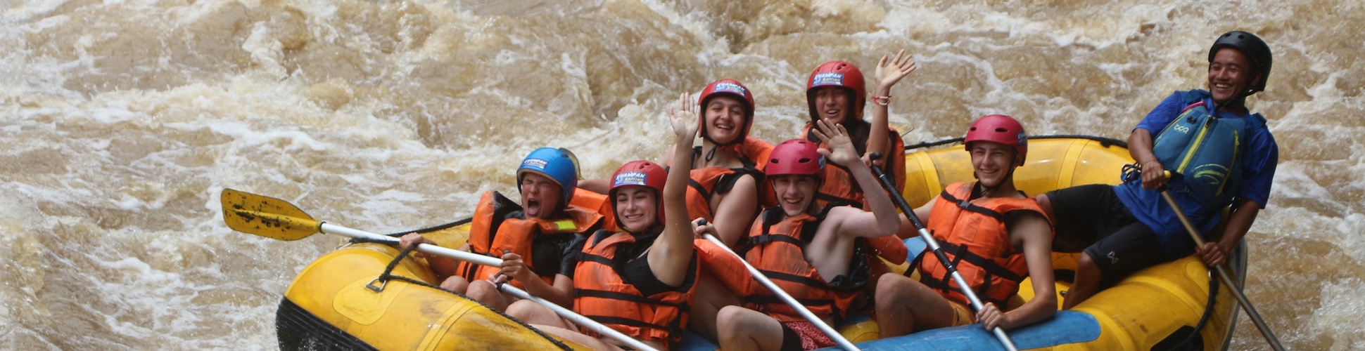 Group of diverse young people smiling at a community event