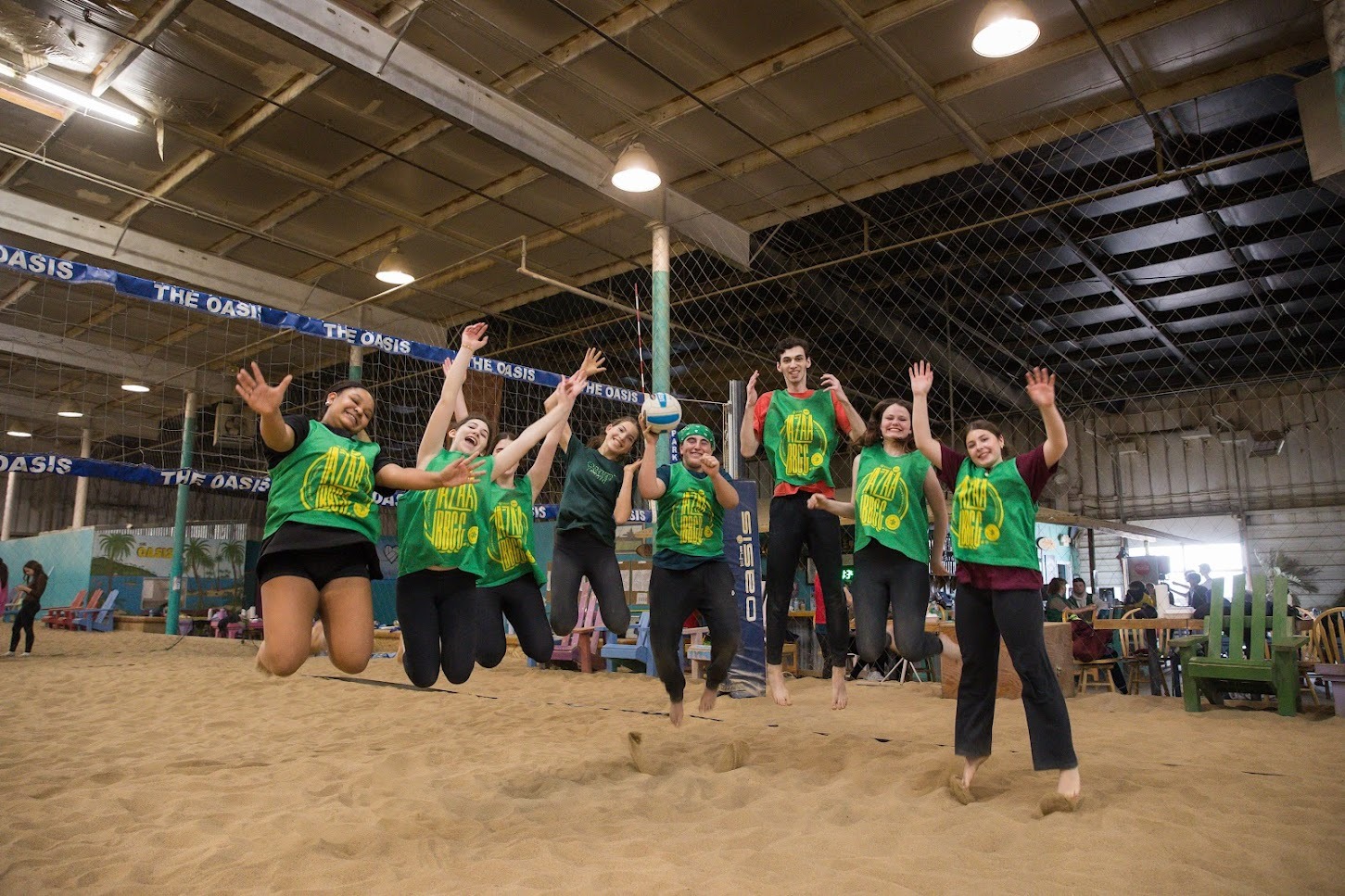 Group of diverse young people smiling at a community event