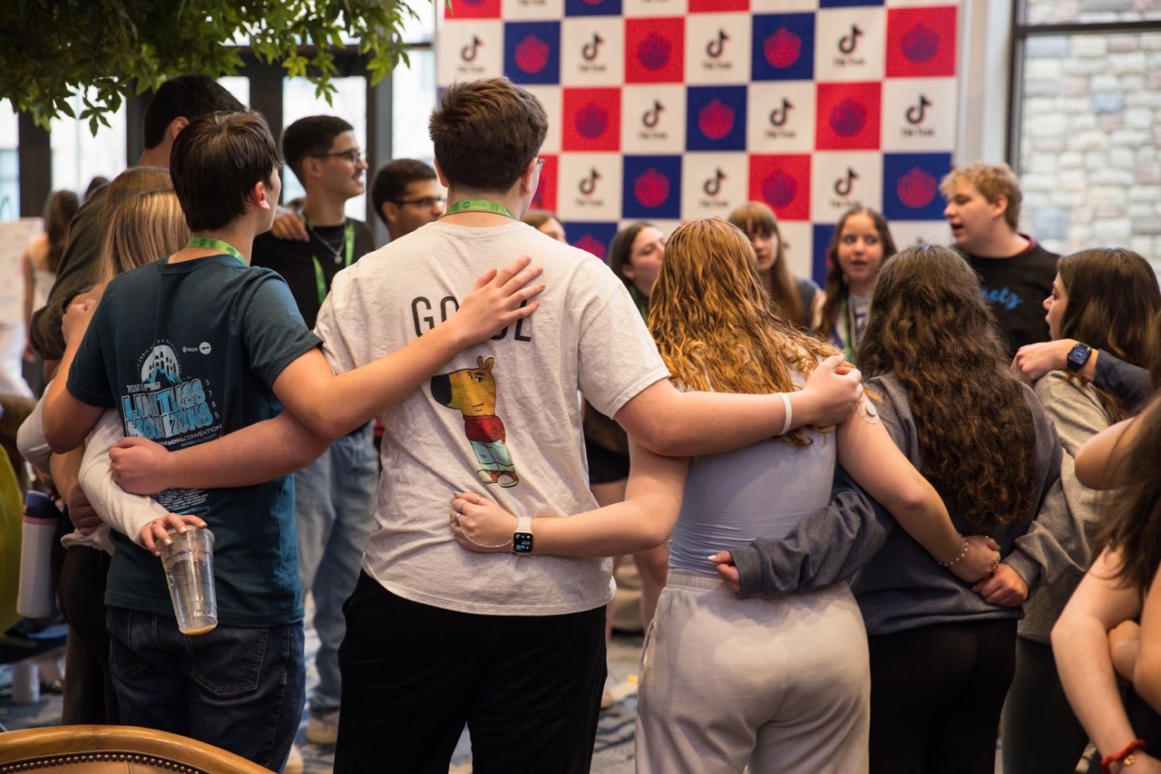 Group of people celebrating on stage
