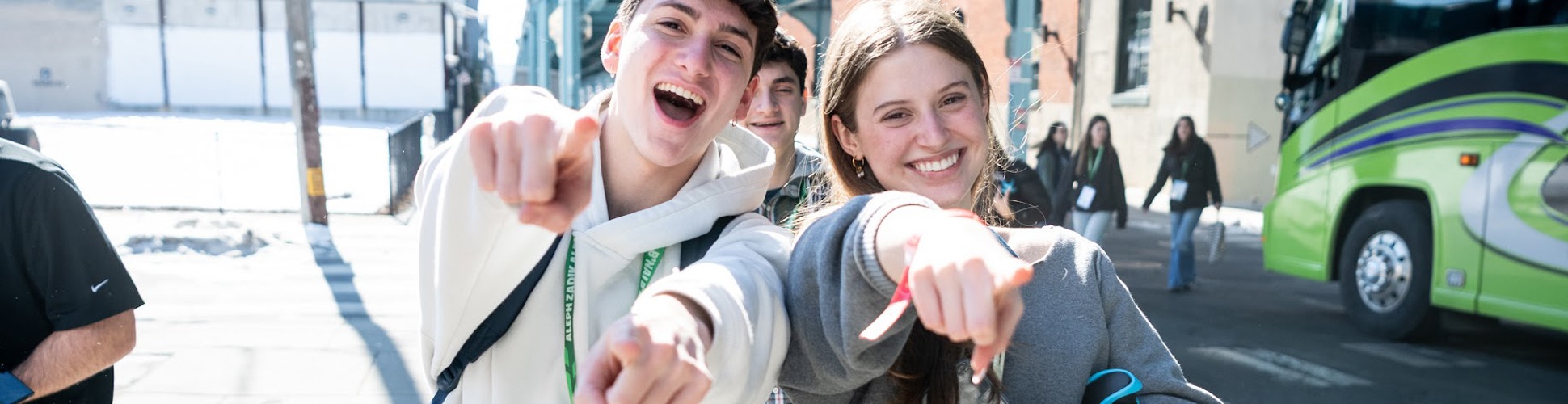 Group of diverse young people smiling at a community event