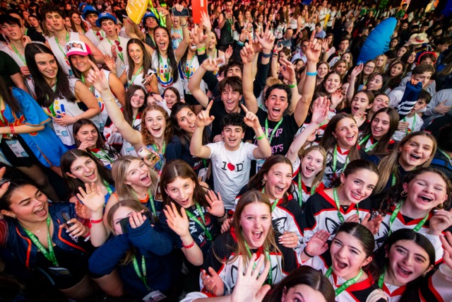 Group of people celebrating on stage