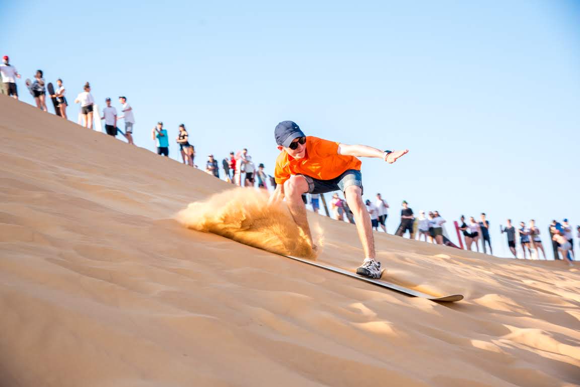 Group of people smiling outdoors
