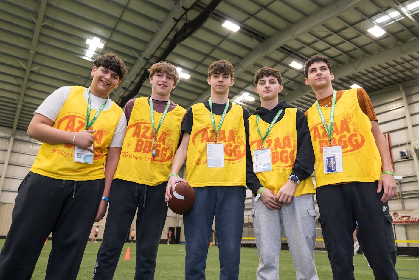 Group of diverse young people smiling at a community event