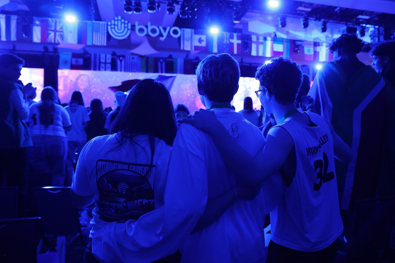 Group of people celebrating on stage