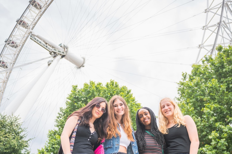 Group of people smiling outdoors