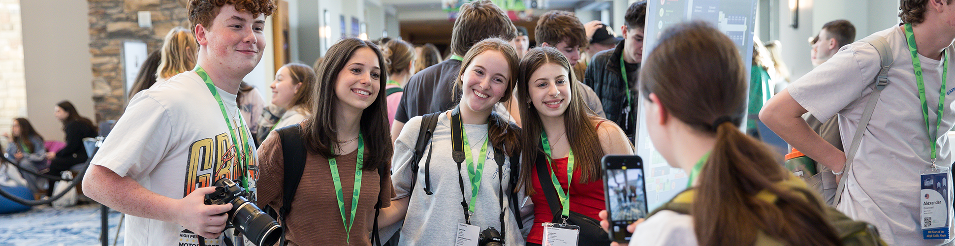 Group of diverse young people smiling at a community event