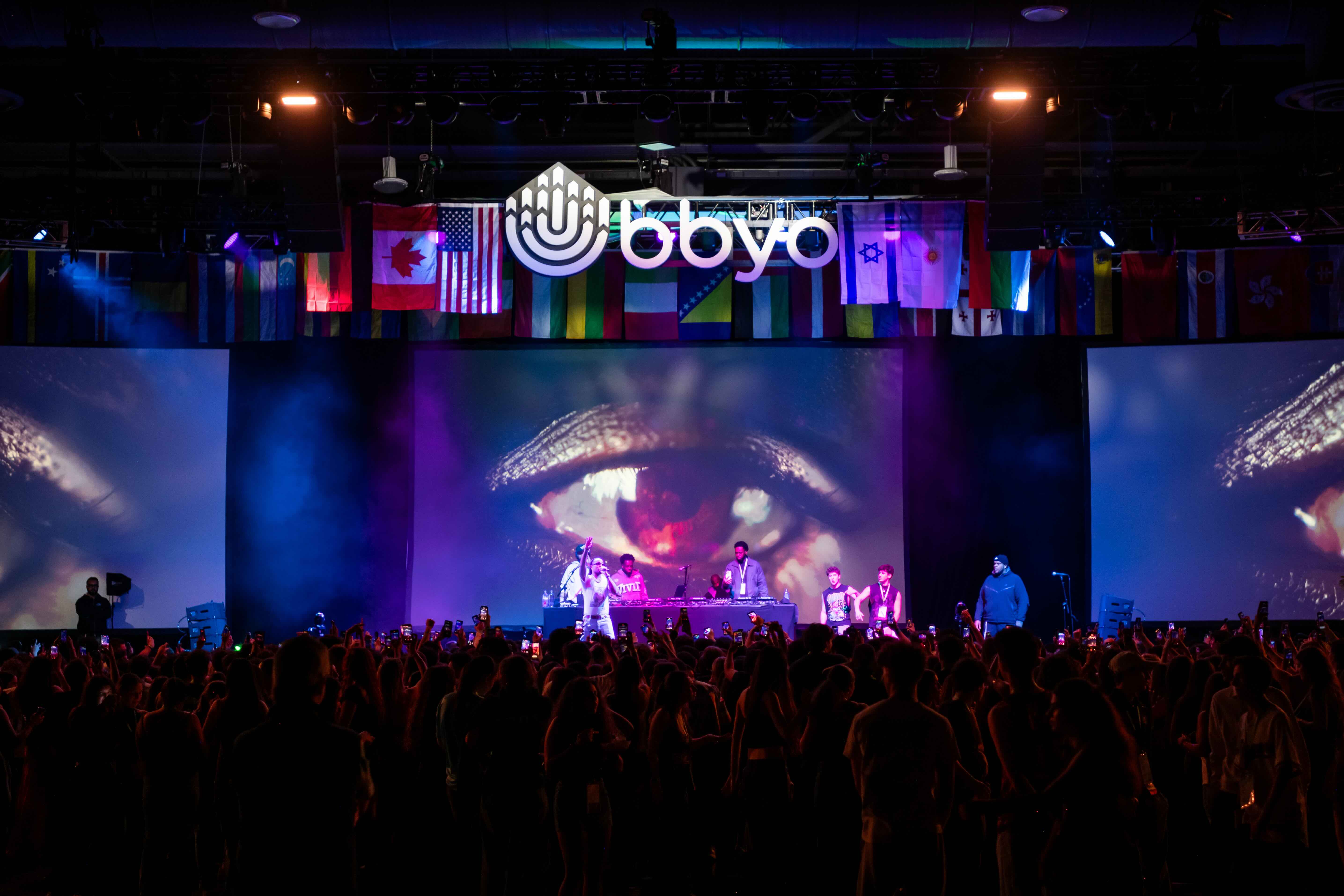 Group of people celebrating on stage