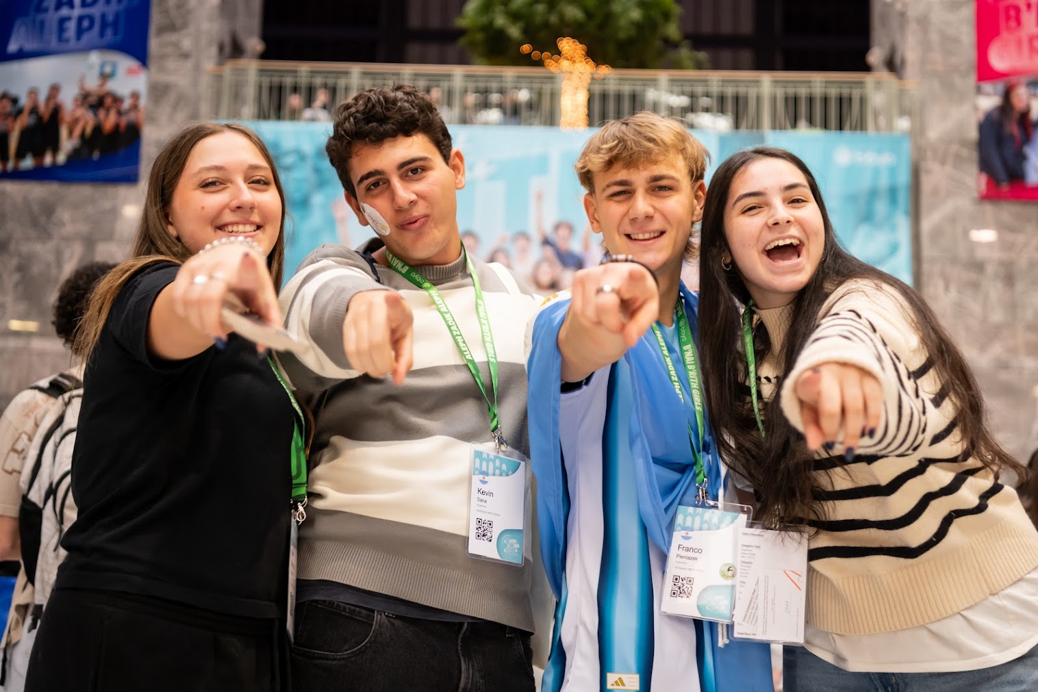 Group of diverse young people smiling at a community event