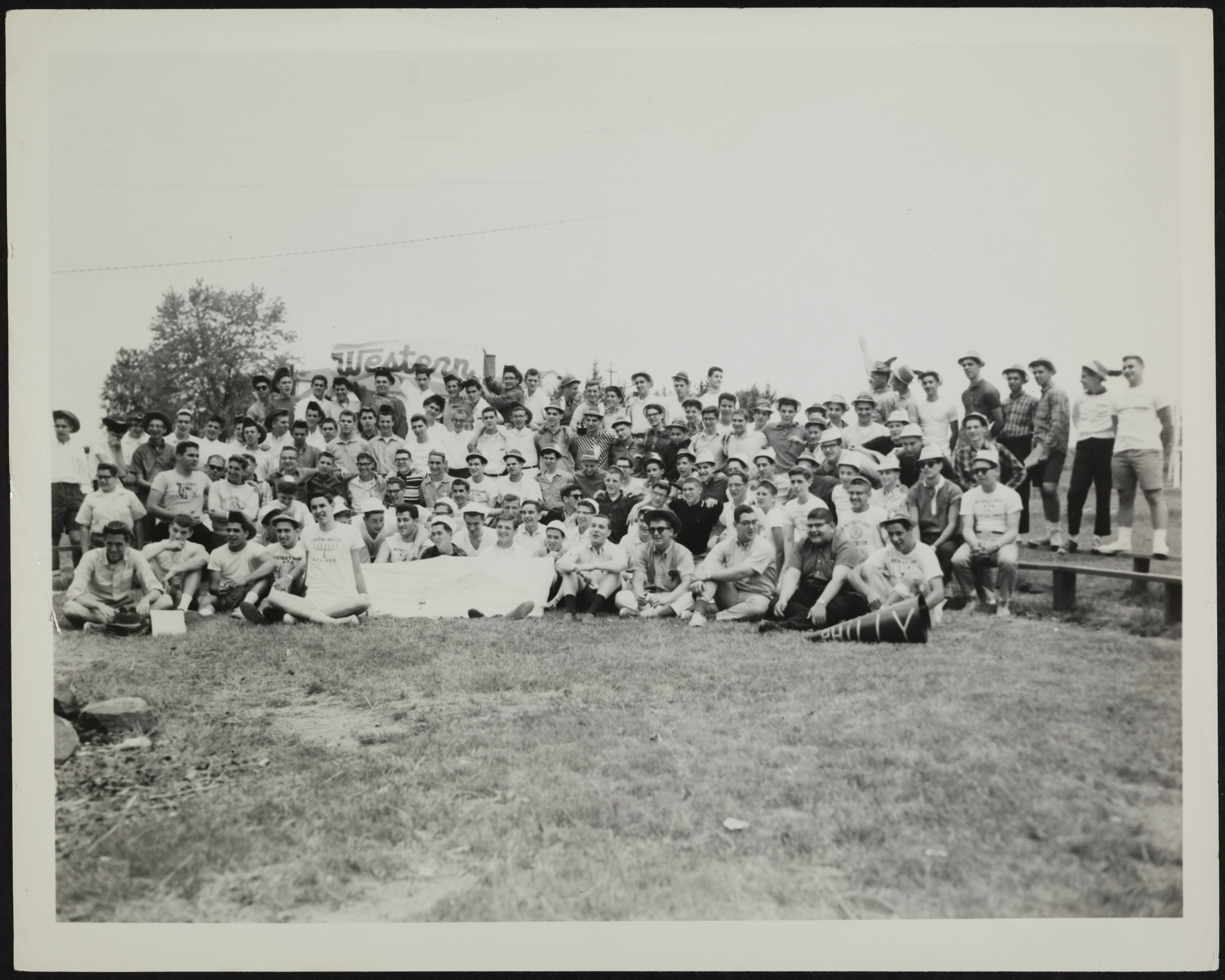 Group of diverse young people smiling at a community event