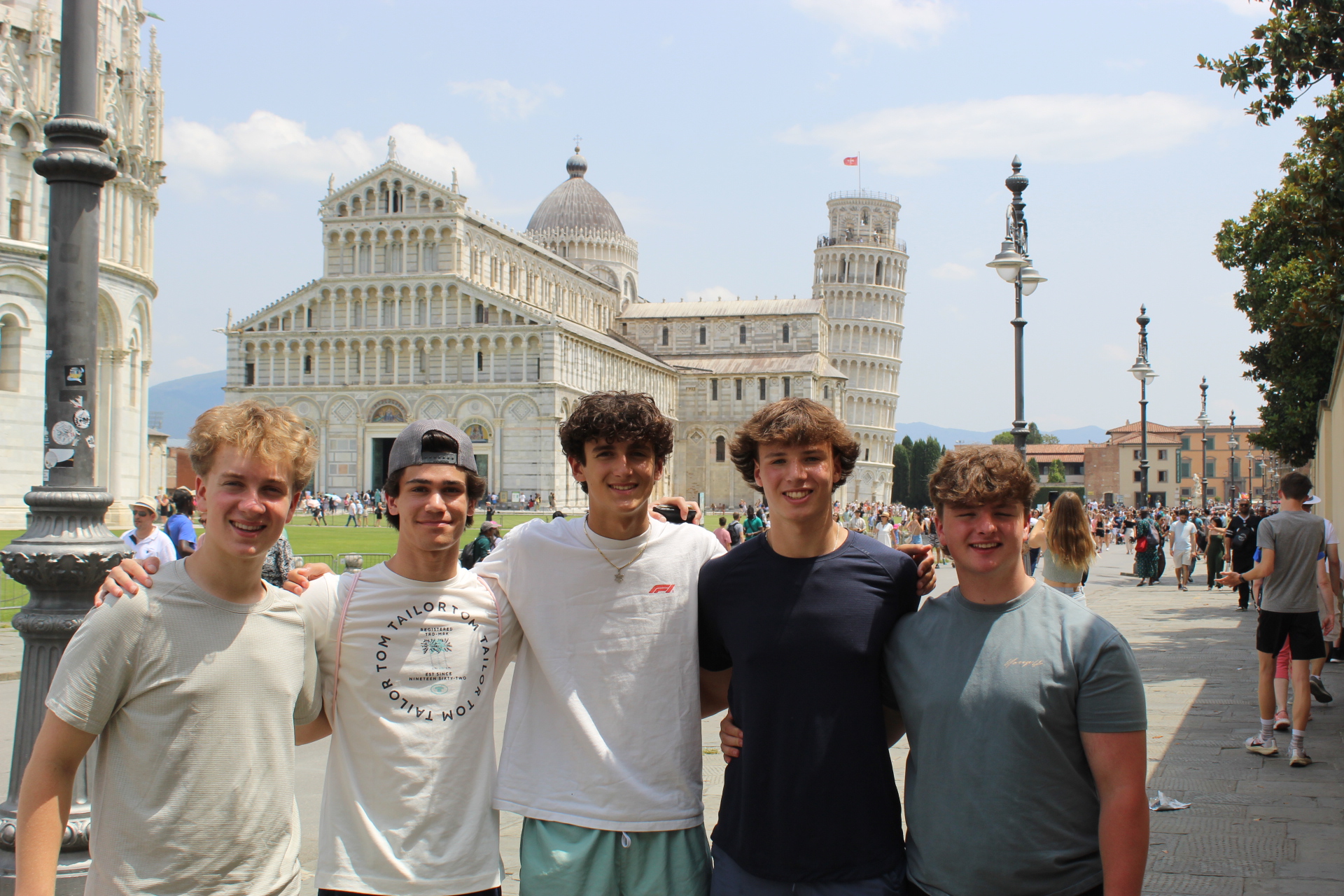 Group of people smiling outdoors
