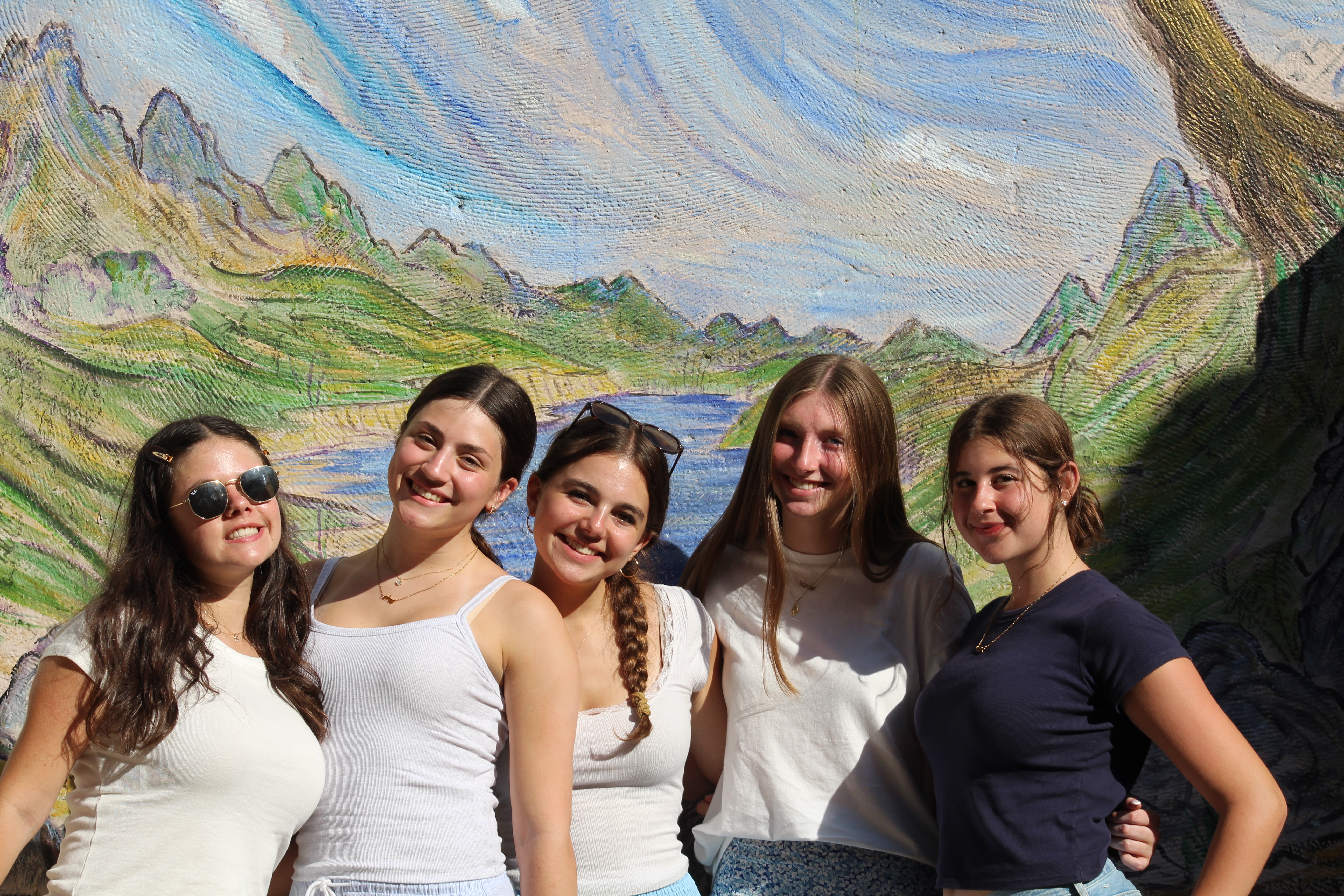 Group of people smiling outdoors