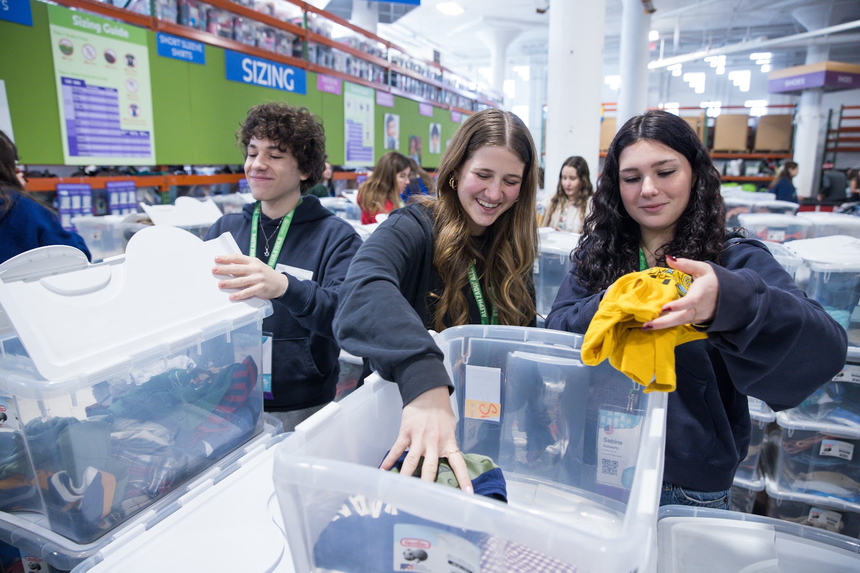 Group of diverse young people smiling at a community event