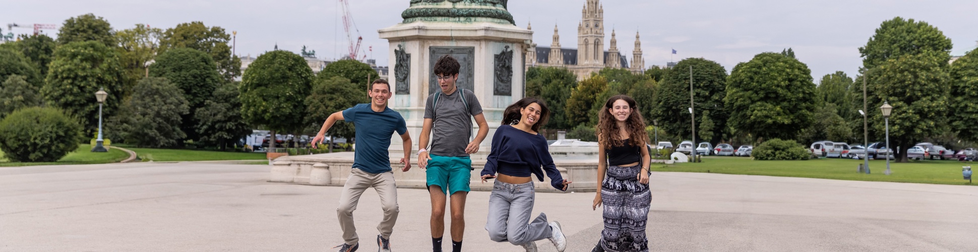 Group of diverse young people smiling at a community event