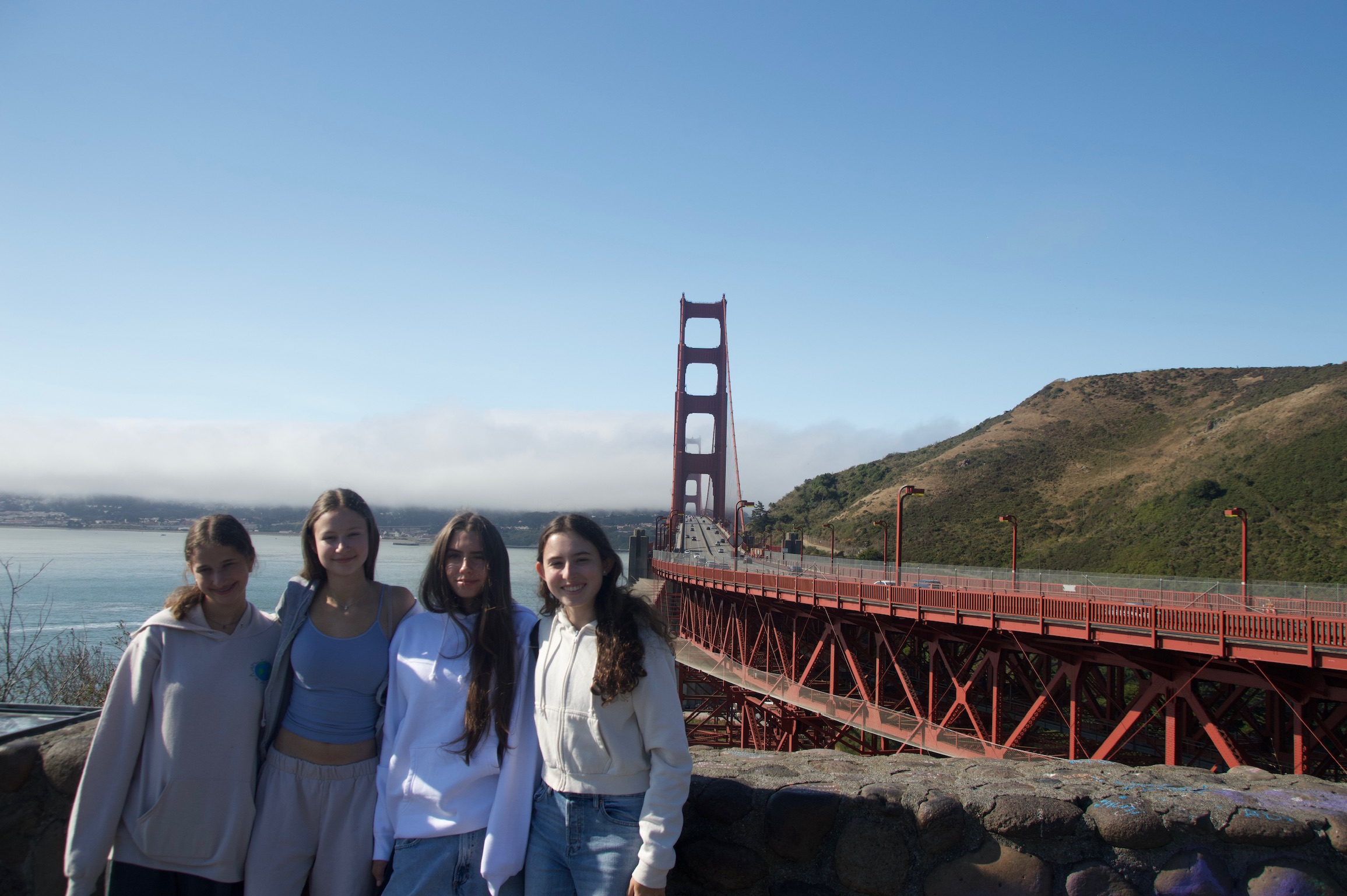 Group of people smiling outdoors