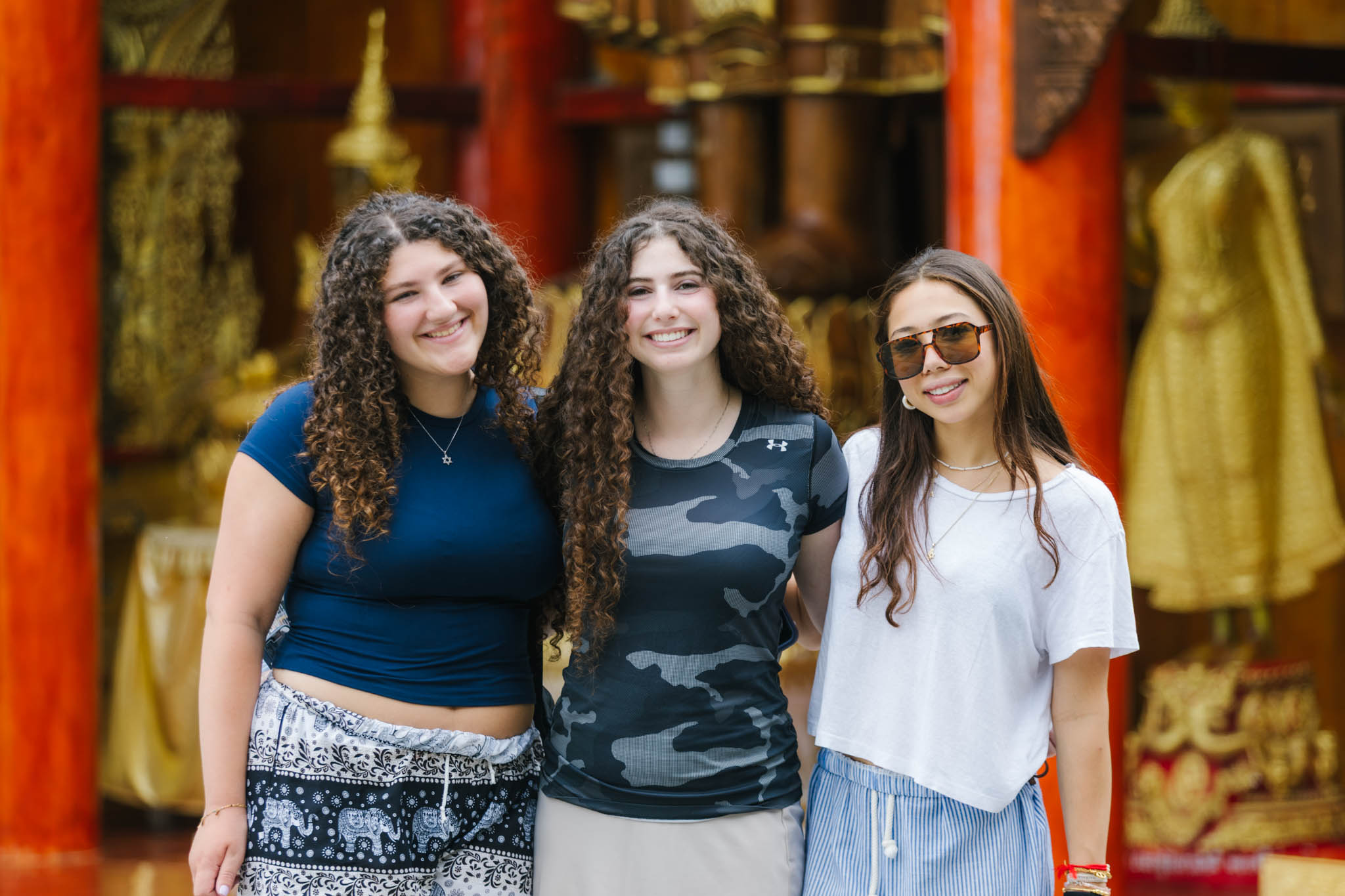 Group of people smiling outdoors