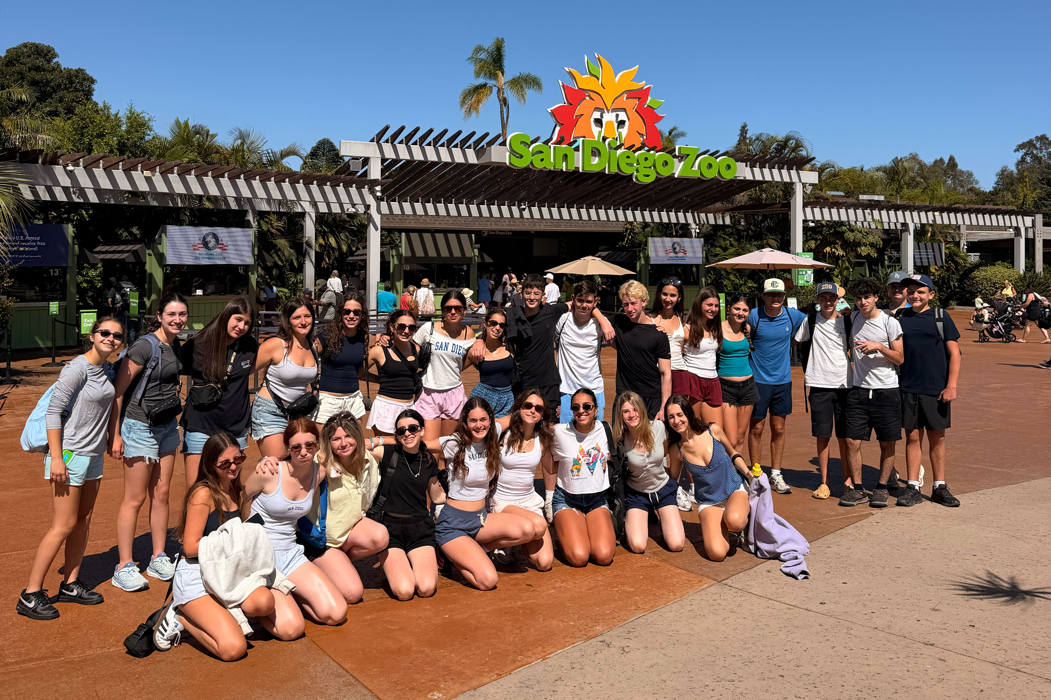 Group of people smiling outdoors