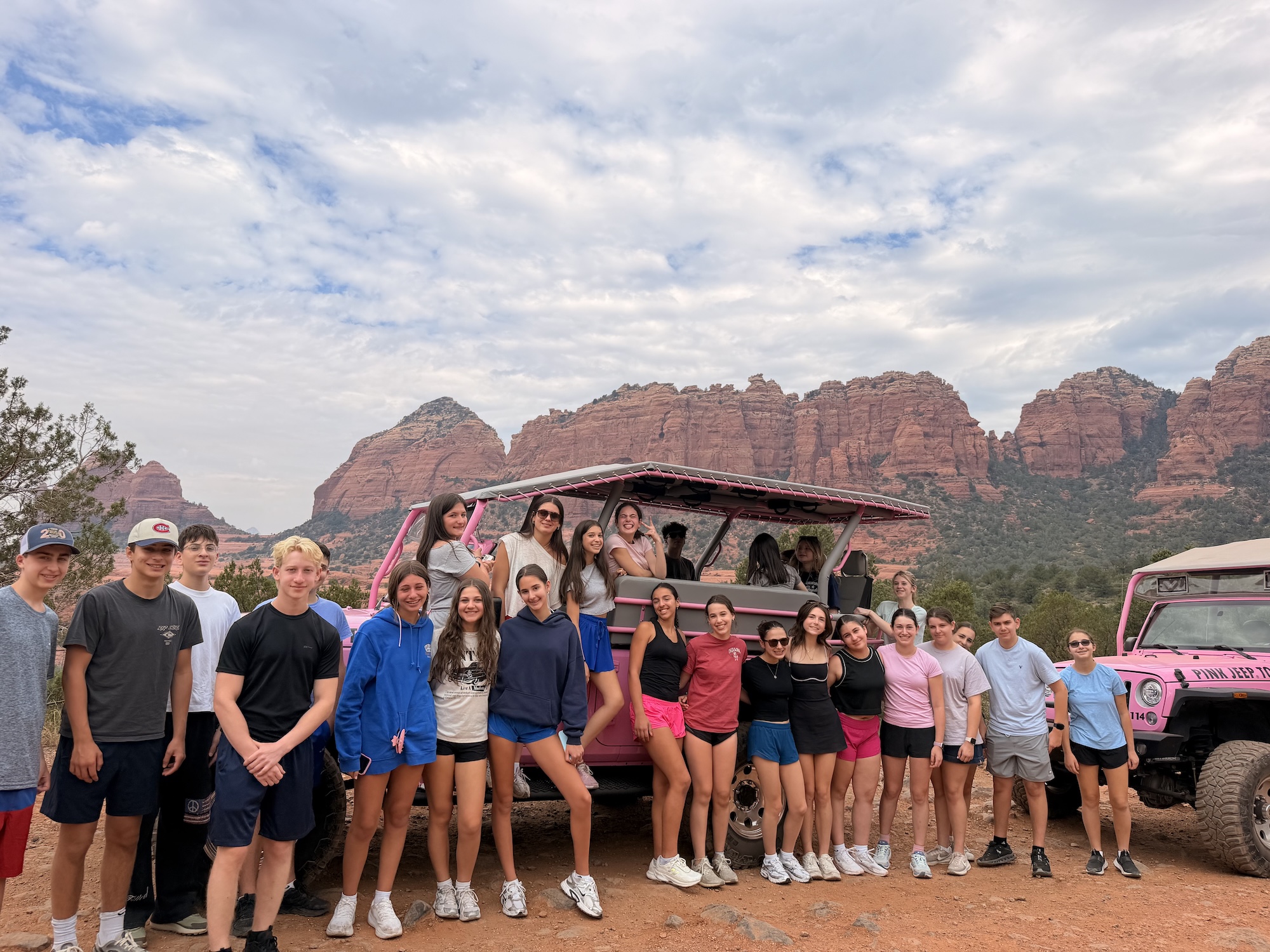 Group of people smiling outdoors