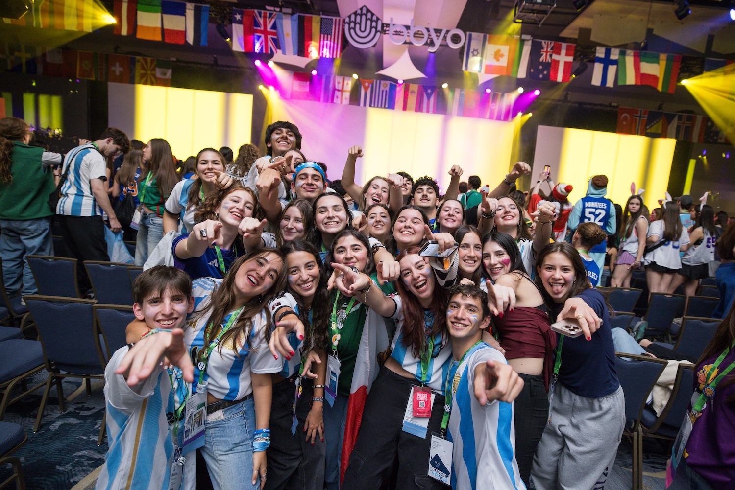 Group of people celebrating on stage