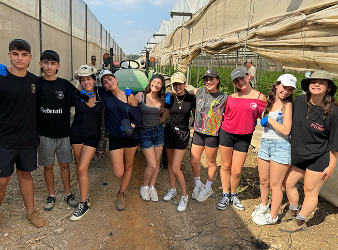 Group of people smiling outdoors