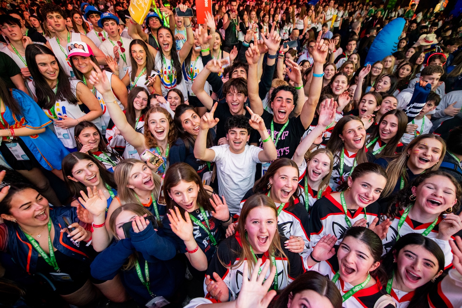 Group of diverse young people smiling at a community event