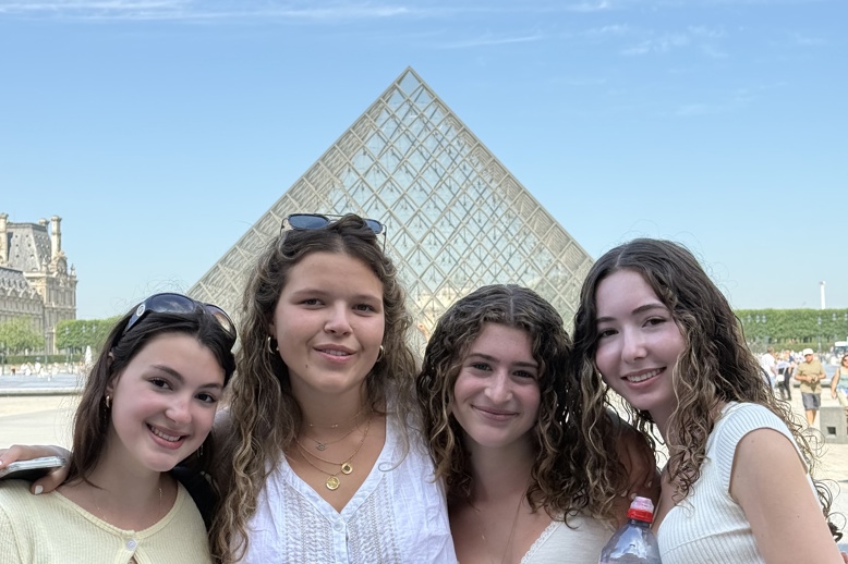 Group of people smiling outdoors