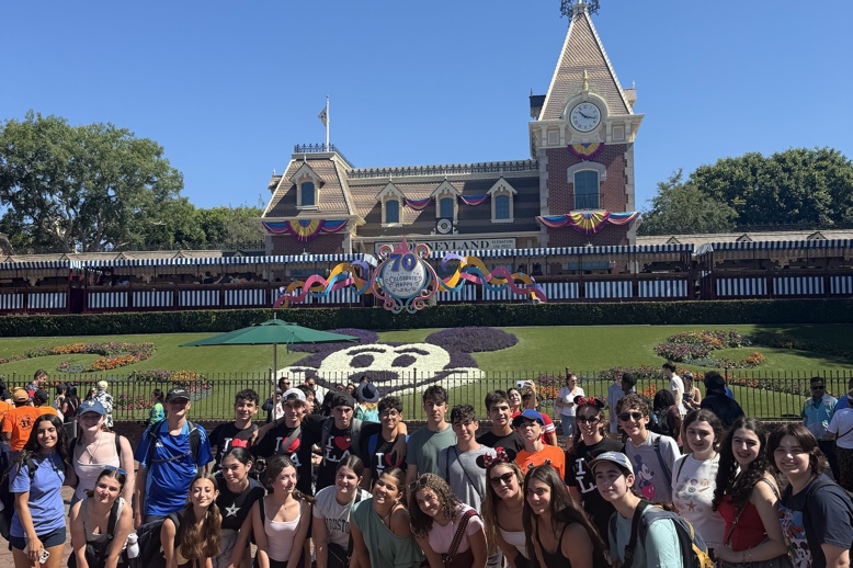 Group of people smiling outdoors