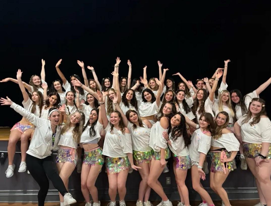 Group of people celebrating on stage