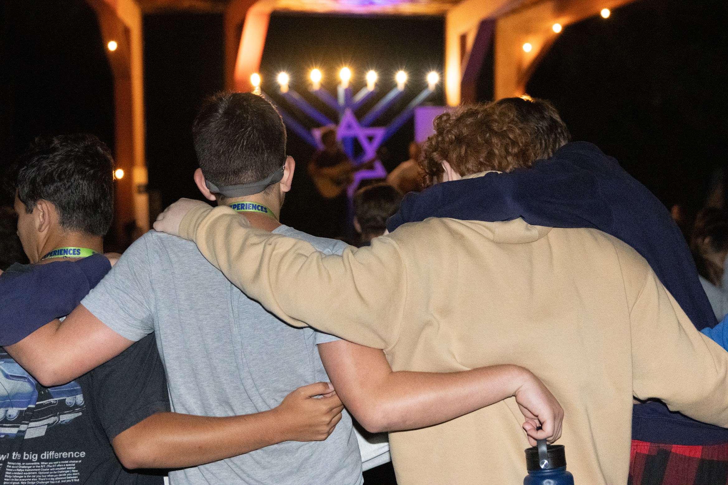 Group of people celebrating on stage