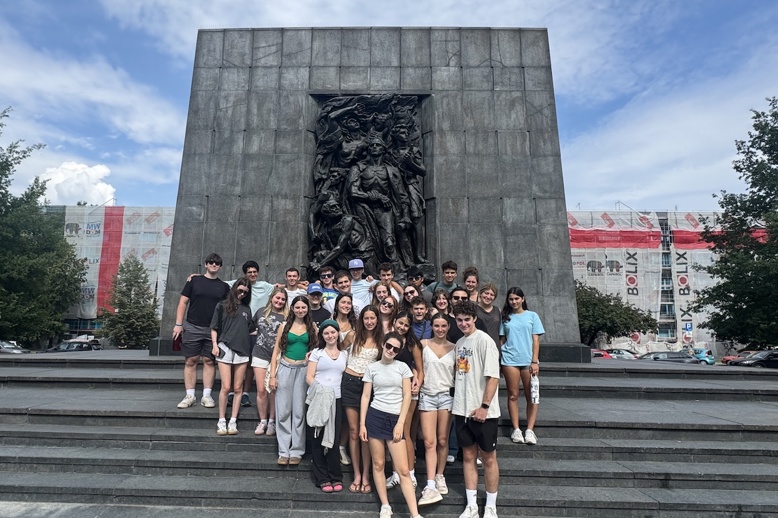 Group of people smiling outdoors