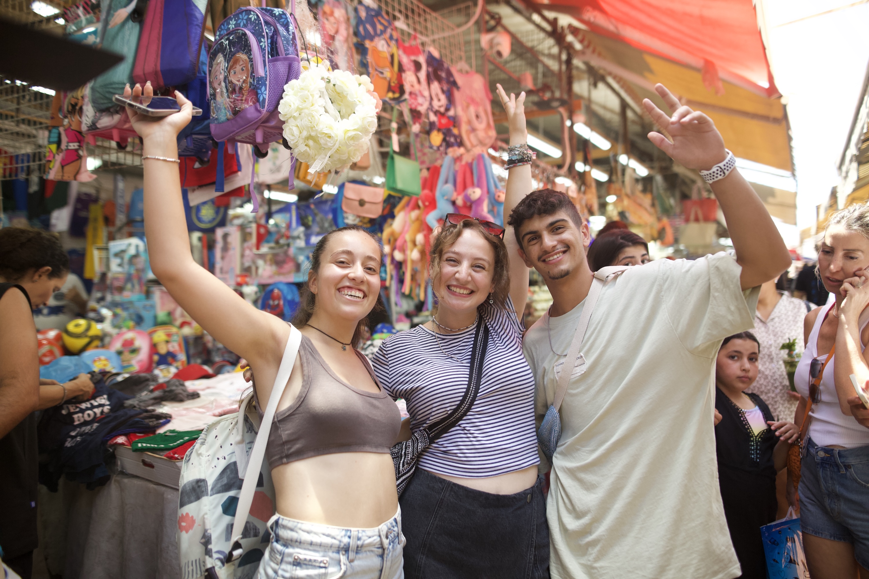 Group of people smiling outdoors
